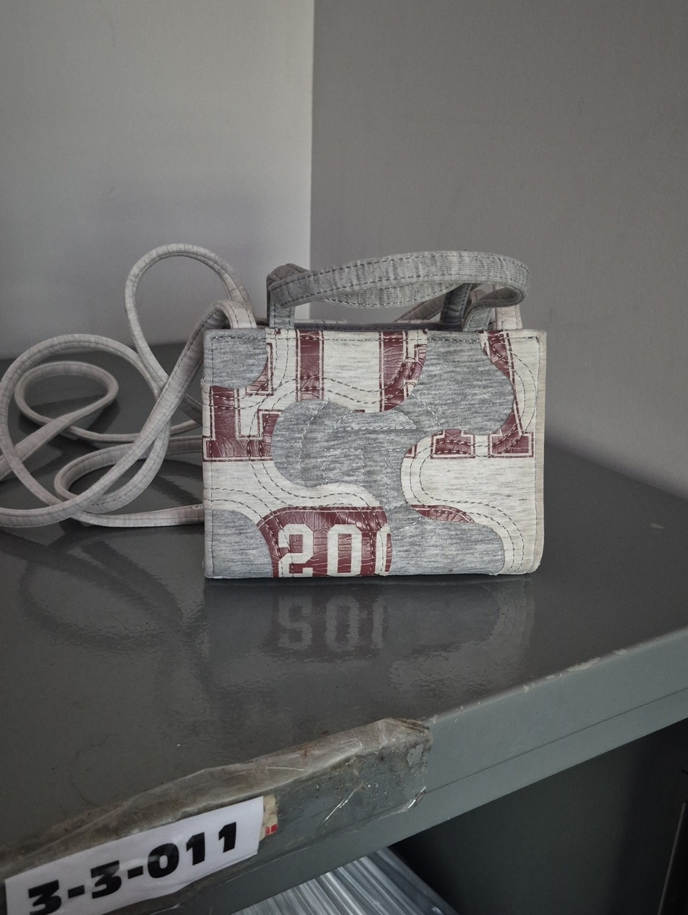 Small Gray and White Crossbody Bag with Red Accents